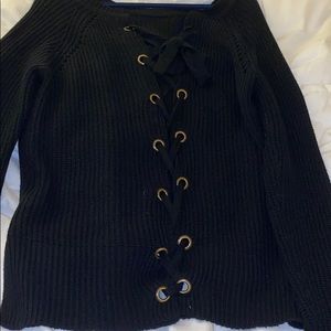 Black sweater with lace up design on back